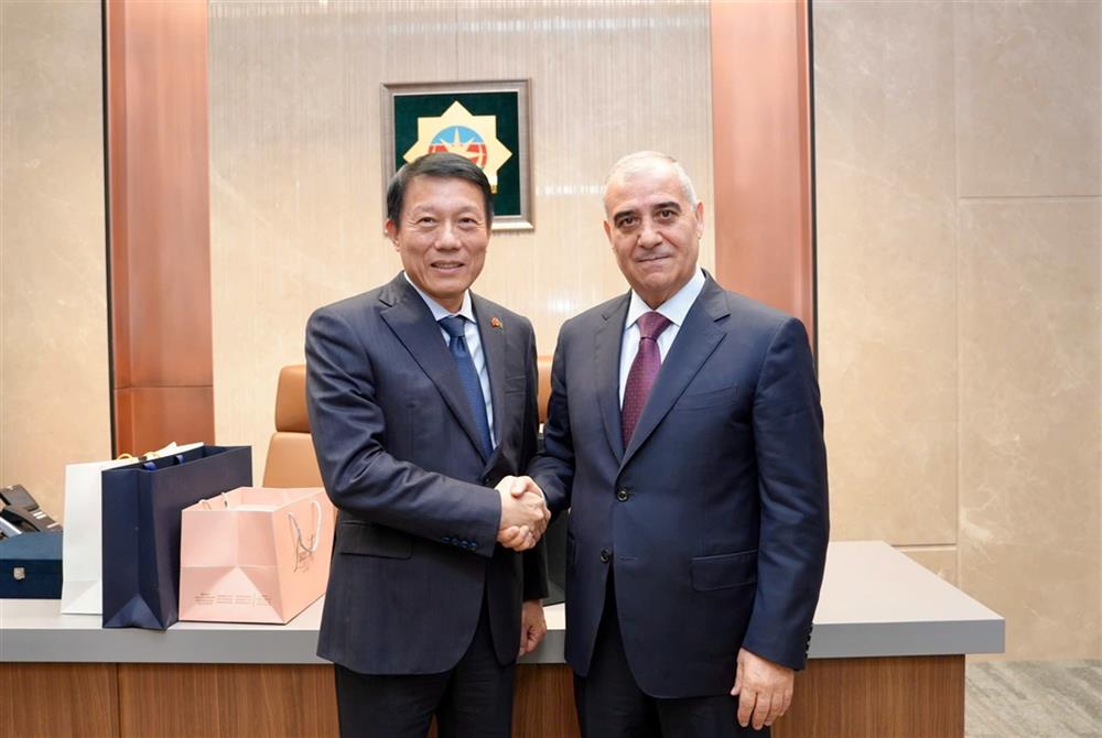 Bộ trưởng Lương Tam Quang và Giám đốc Cơ quan An ninh Azerbaijan Ali Naghiyev.